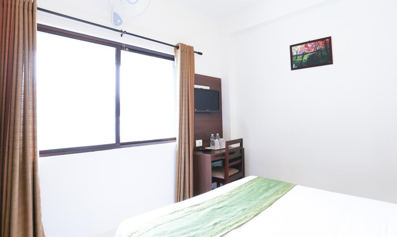 Treebo Trip Swiss Garden Hotel มุนนาร์ ภายนอก รูปภาพ